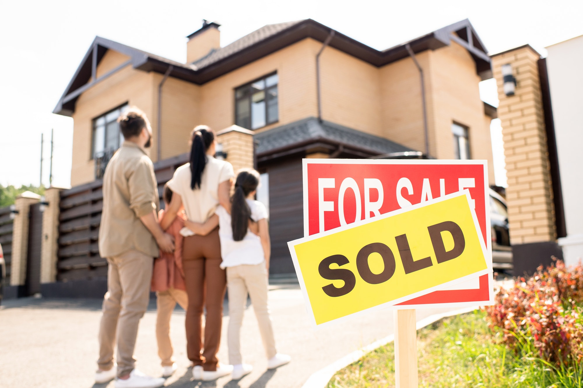 Family looking at new house